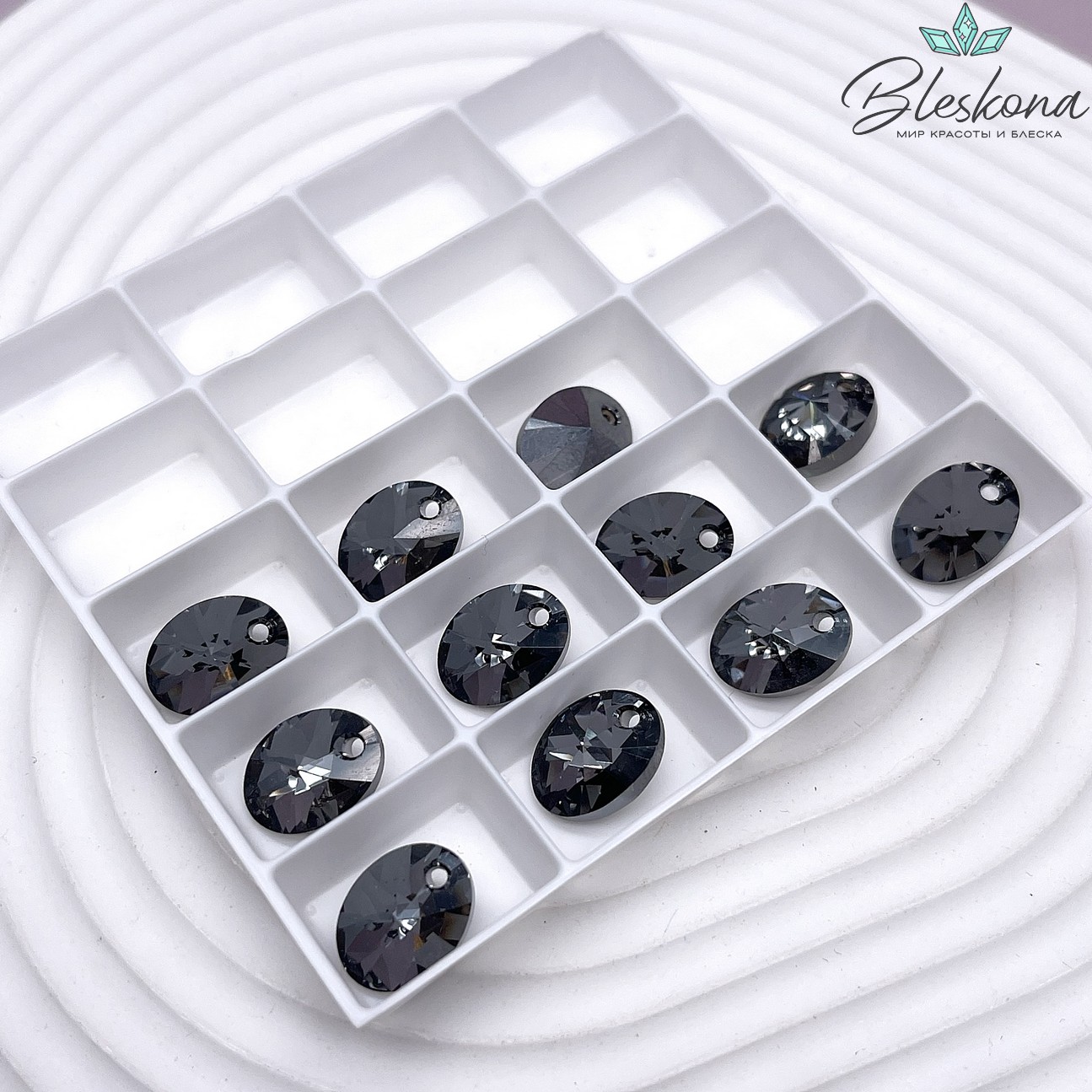 6028 XILION Oval 12 мм Crystal Silver Night (SINI)