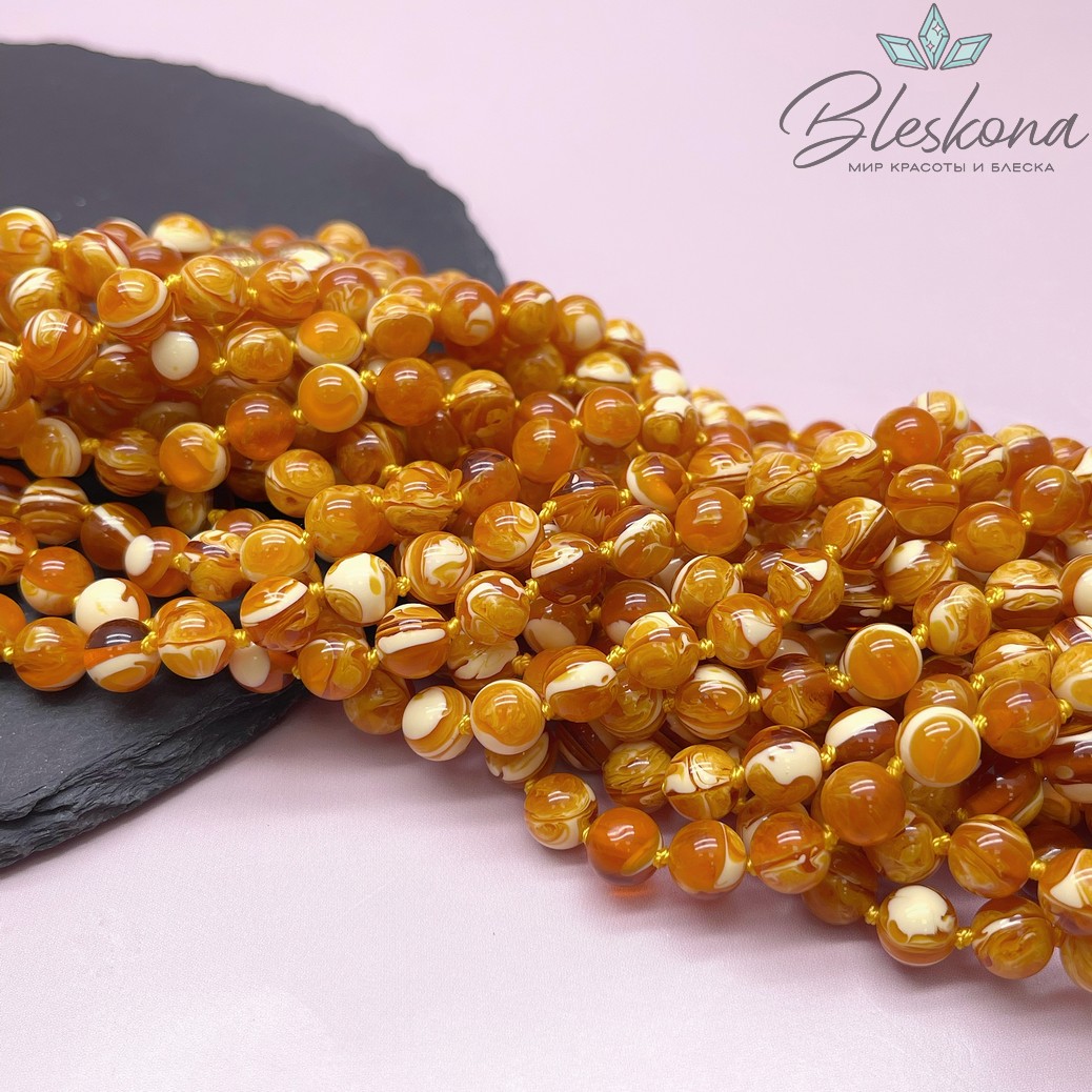 Янтарь шар оранжевый с белыми включениями