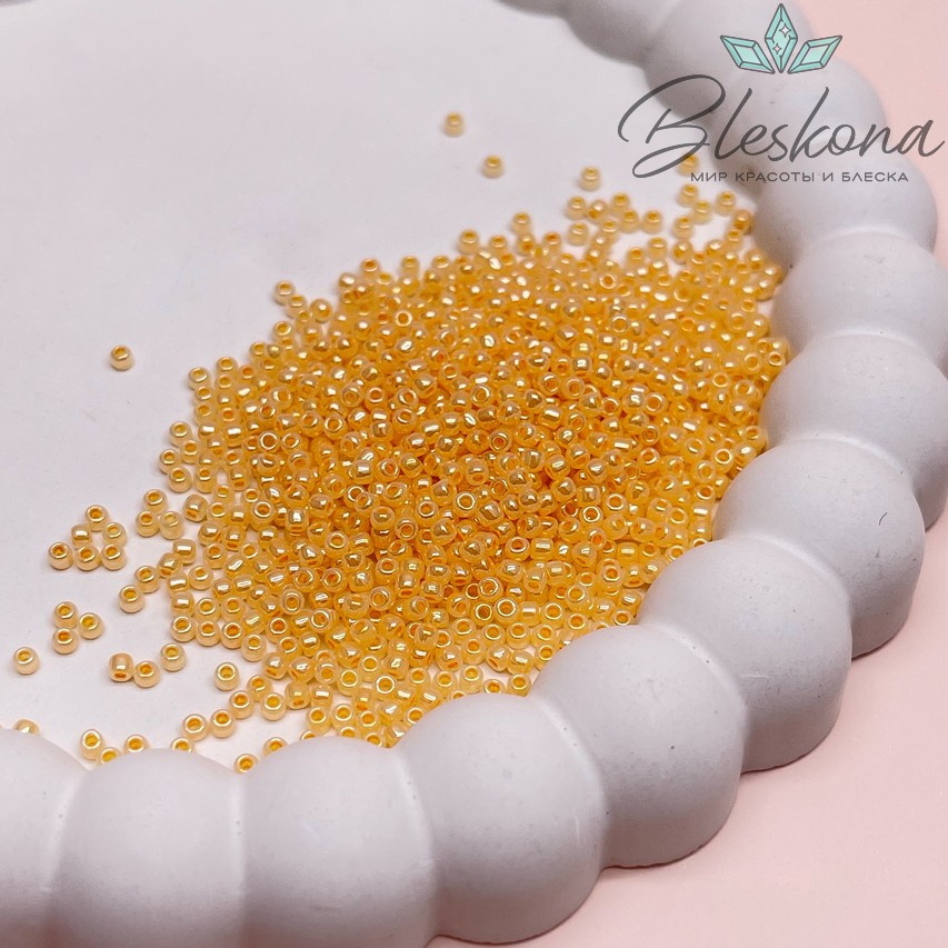 Бисер TOHO round 11/0 цвет №148 (оттенок оранжевого)