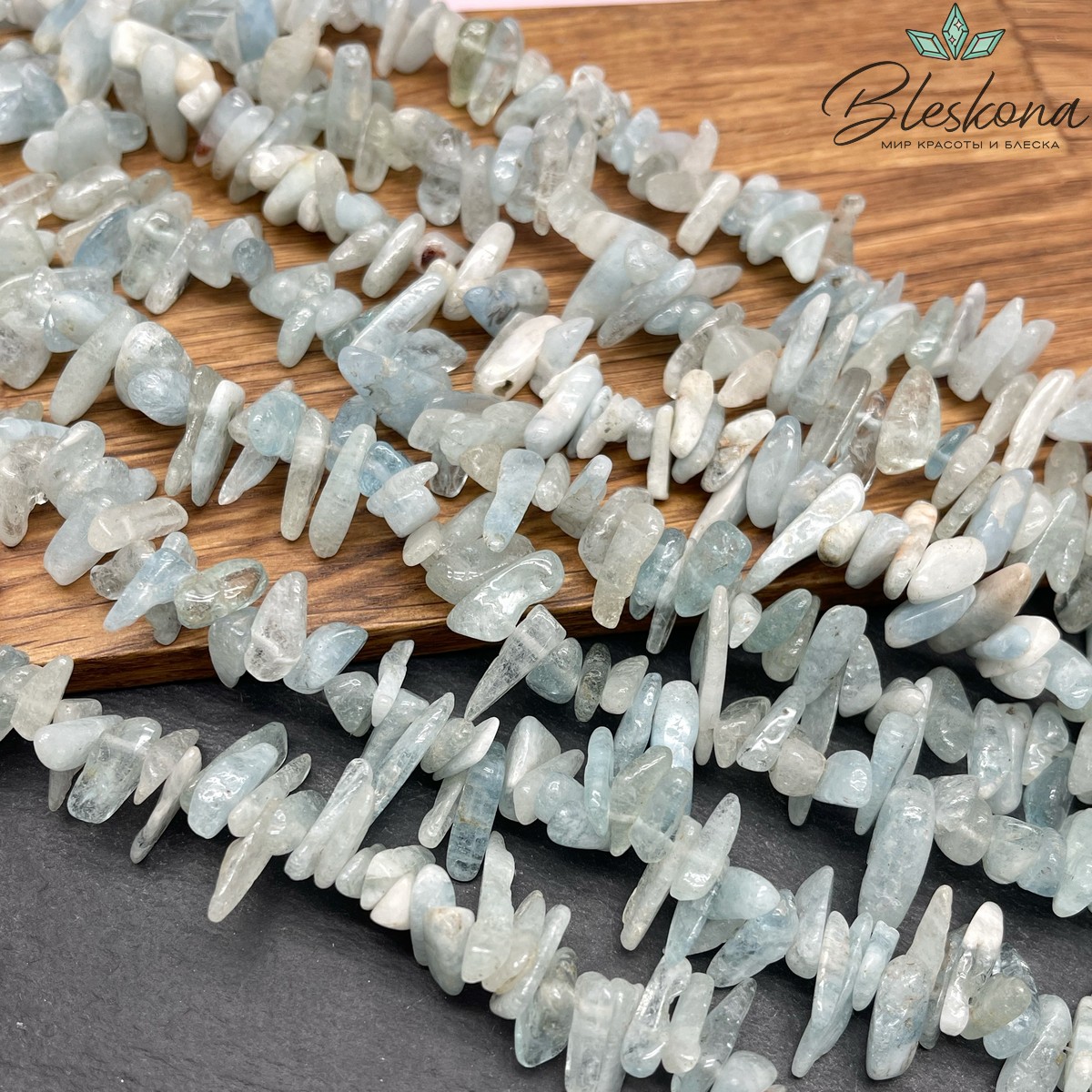 Аквамарин сколы шлифованные 10-22 мм