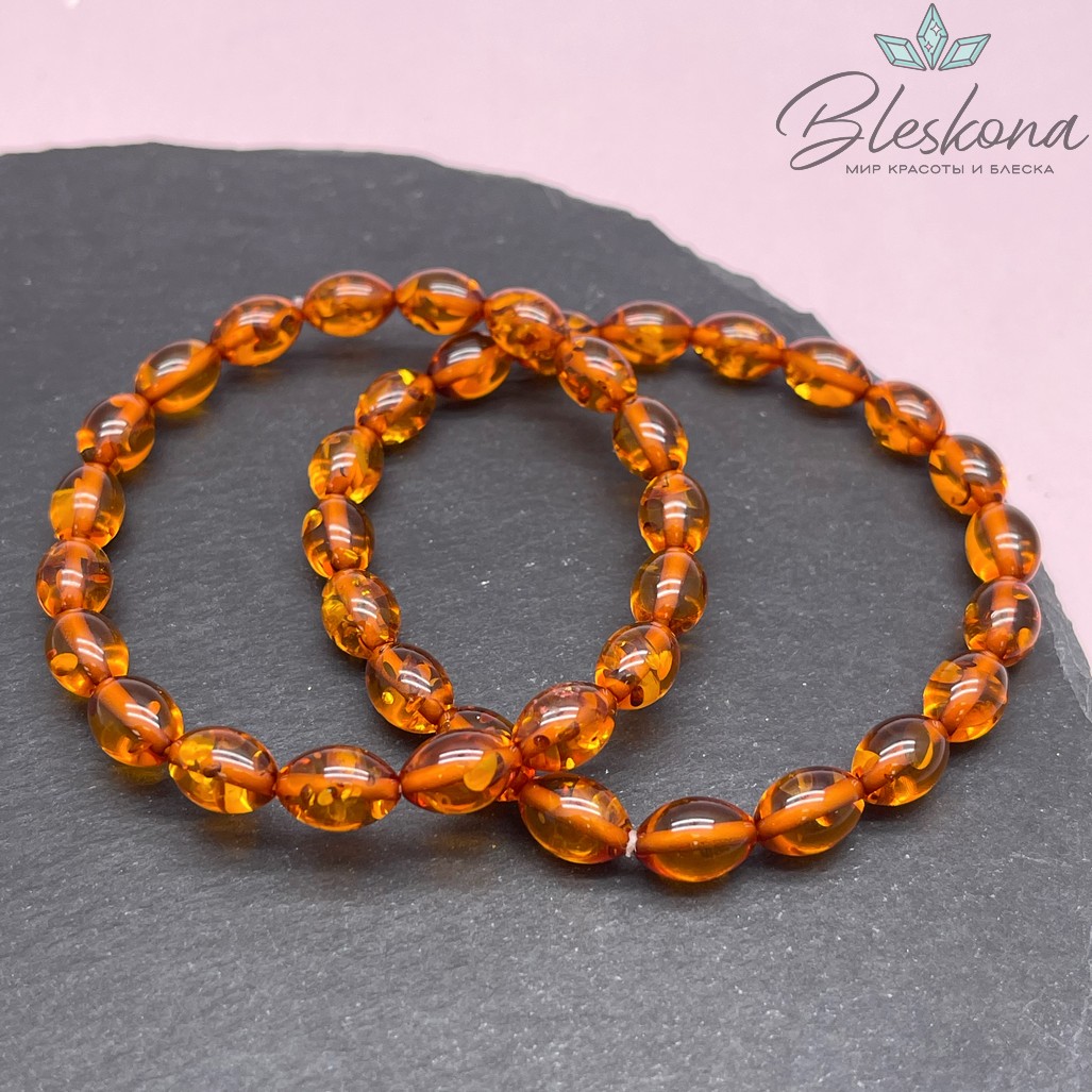 Янтарь коричневый рис  7*11мм сет 20см