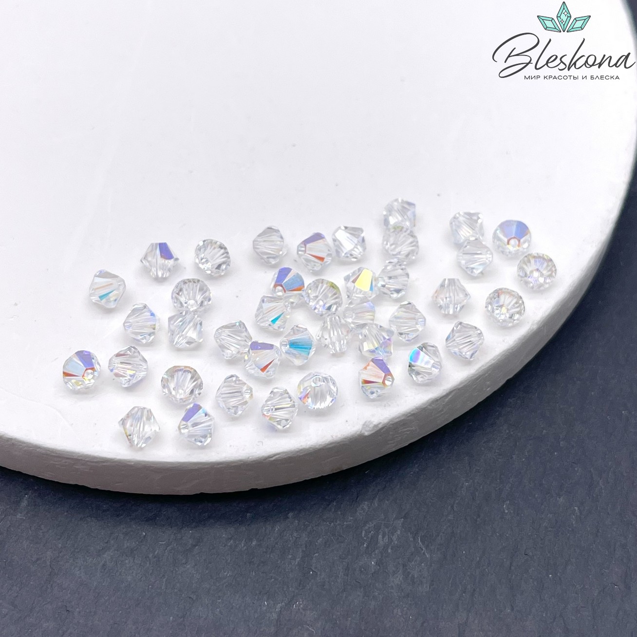 5328 Xilion Bicone 4 mm Crystal Aurore Boreale уп. 20шт