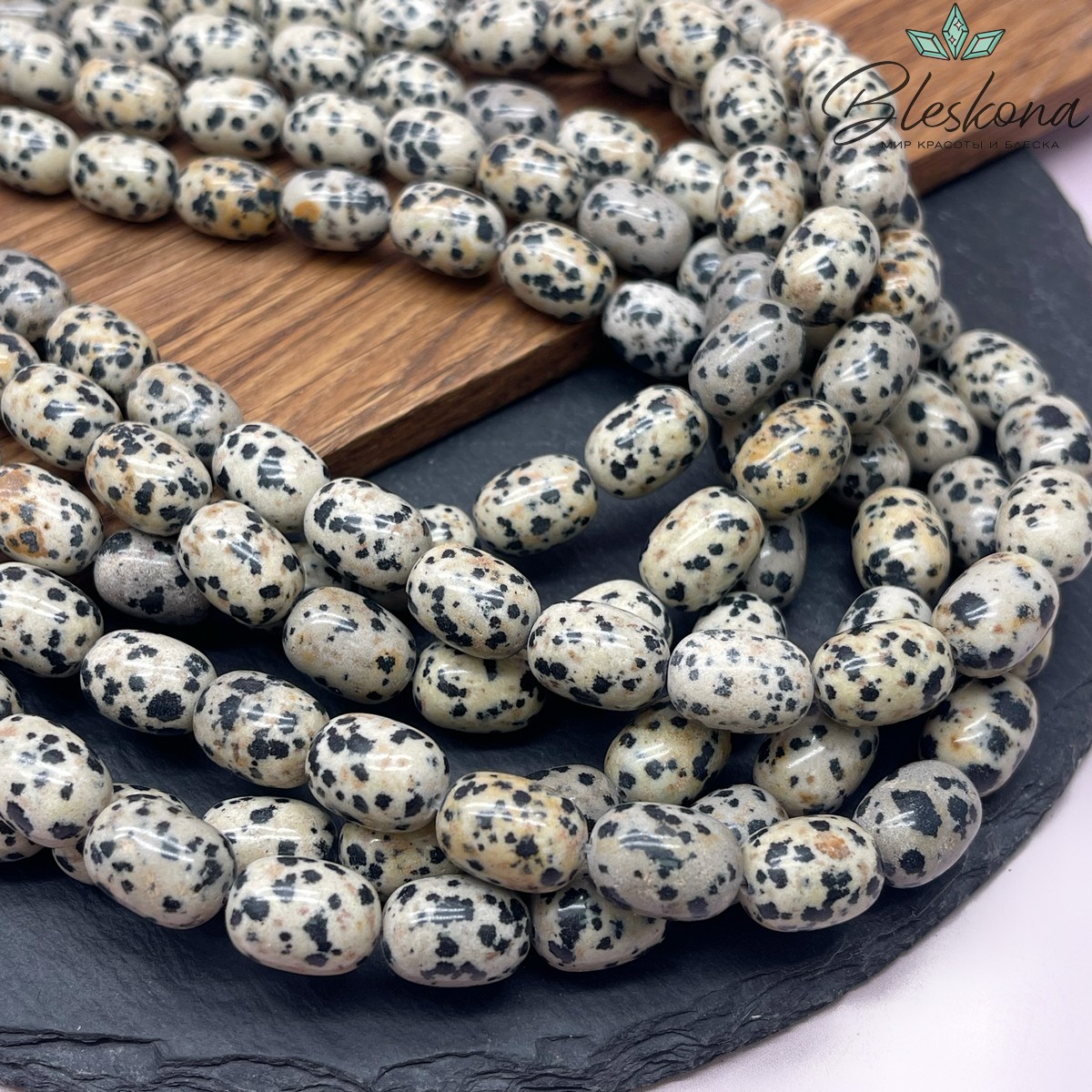 Яшма далматиновая бочата 14*10 мм