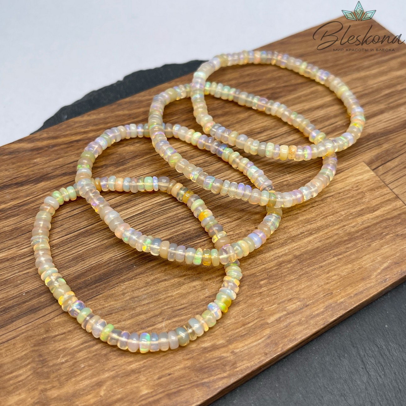 Опал Эфиопский с радужным переливом №2 5,5 мм сет 17 см