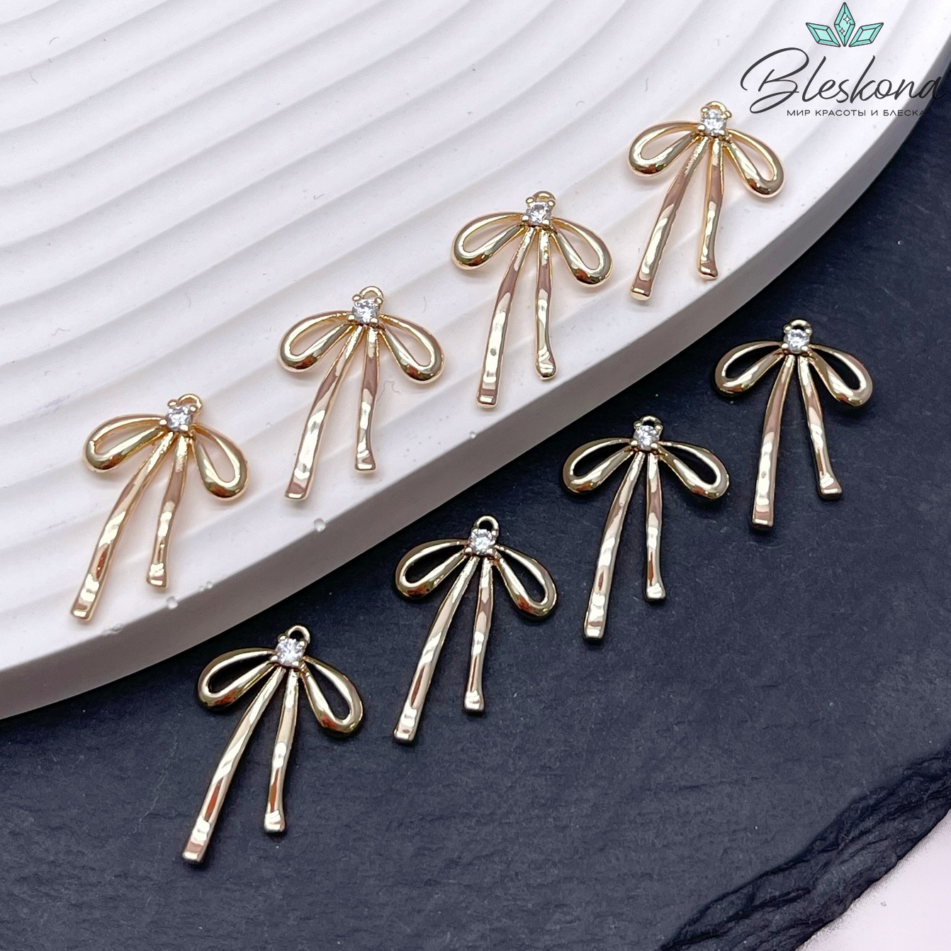 19,6*13,2 мм Цвет золото, Подвеска бантик с цирконом (слева)