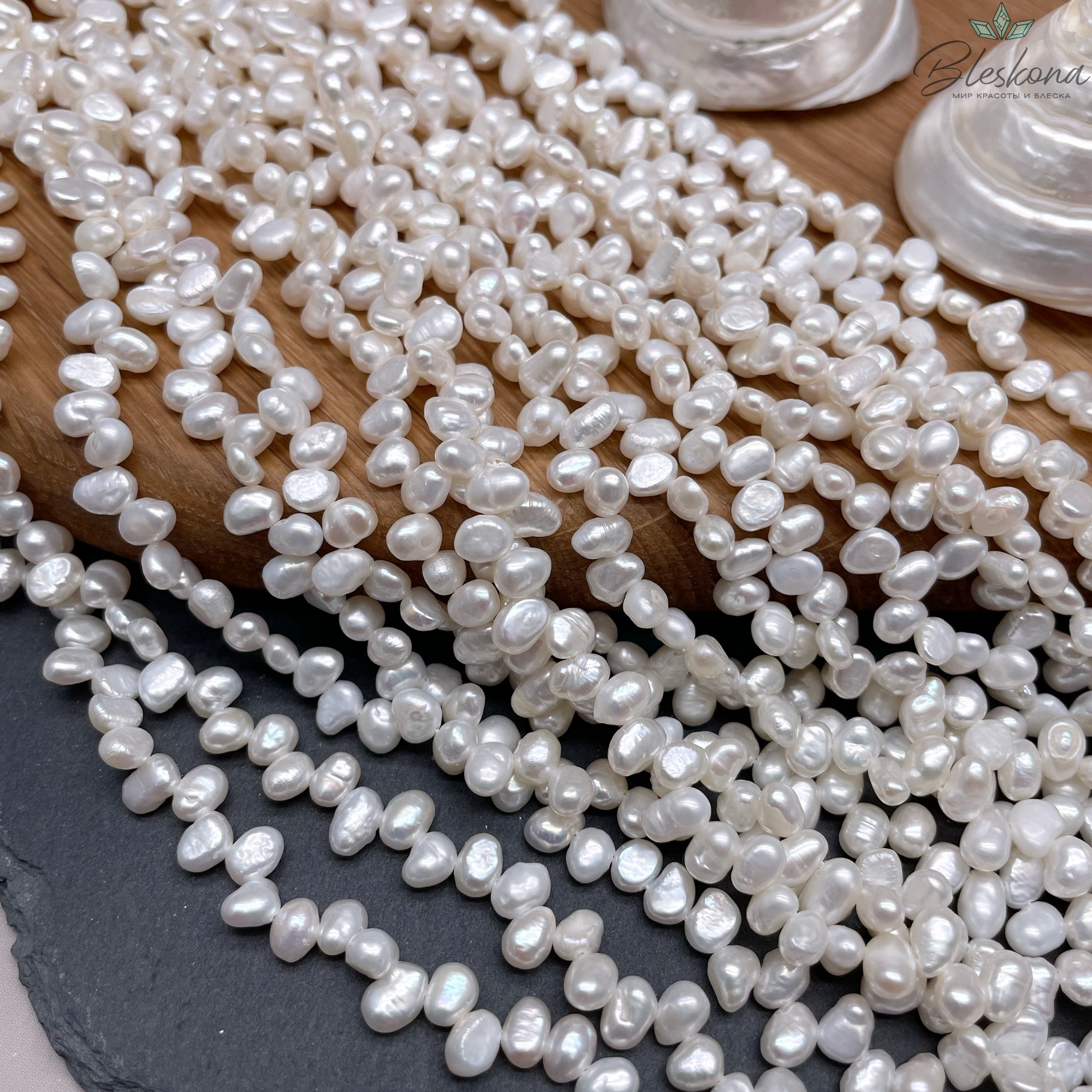 Жемчуг барочный рис белый смещенный центр 6-7 мм 