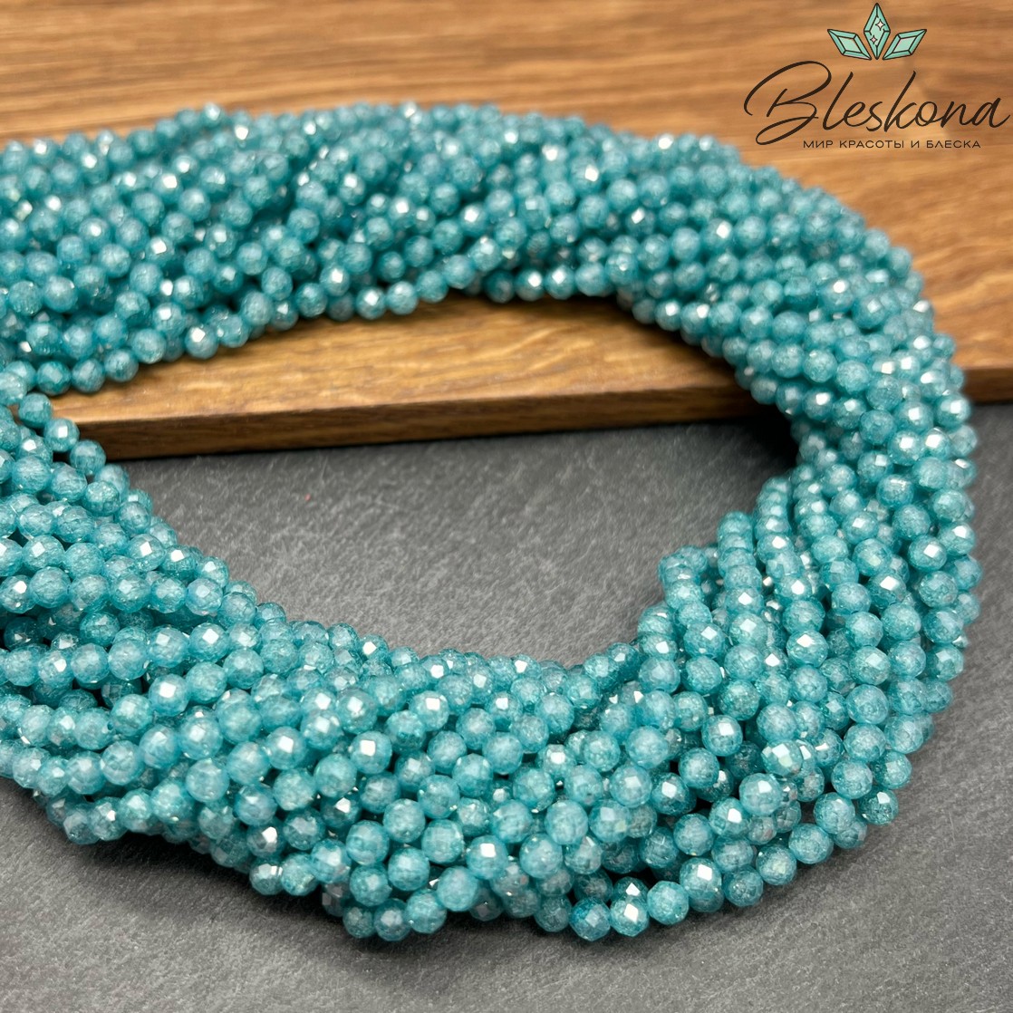 Циркон Glow темно-бирюзовый огранка 4 мм (кубический цирконий, фианит) 