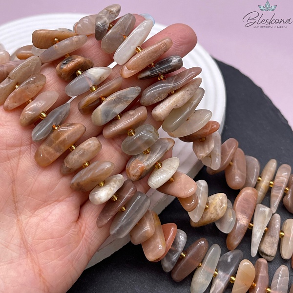 Солнечный камень сколы шлифованные 17-27 мм