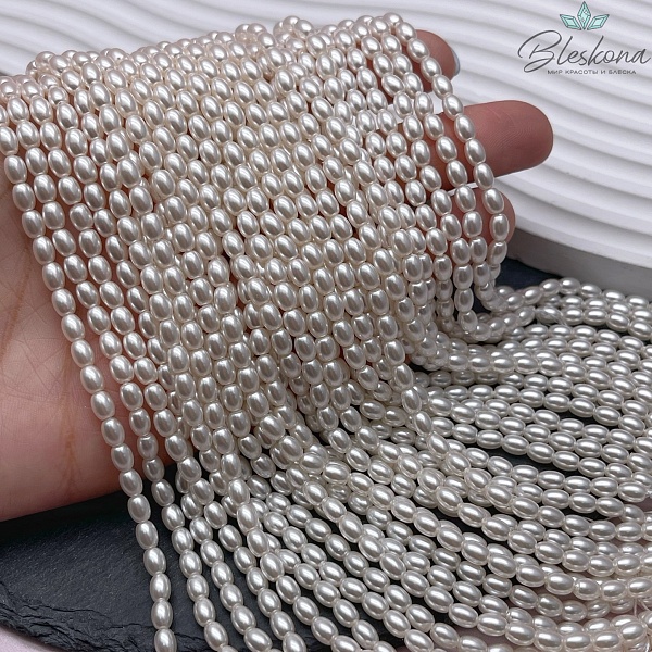 Жемчуг Майорка пудровая рис 3,5*4,5 мм