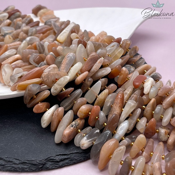 Солнечный камень сколы шлифованные 17-27 мм