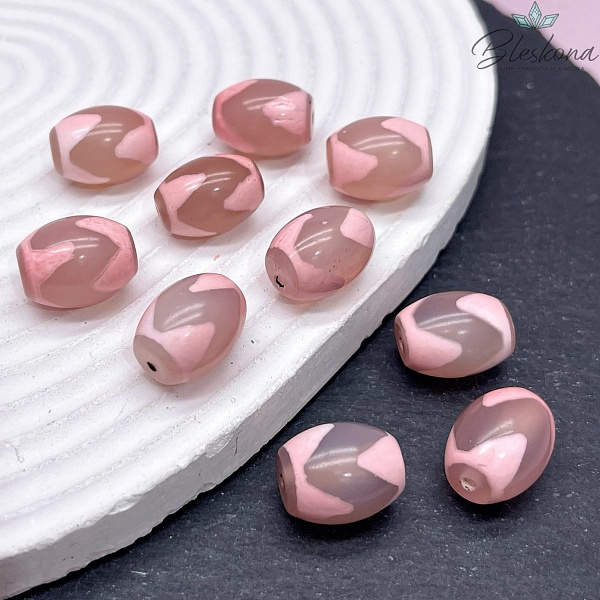 Бусина Дзи Тигриный клык розовый бочонок 16*12 мм