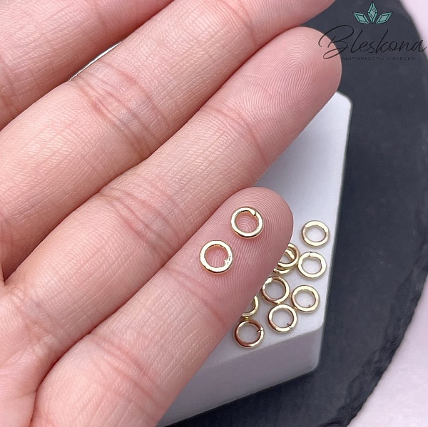 Колечки неразъемные, цвет золото уп. 1 гр. 5*0,9 мм
