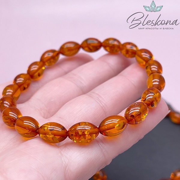 Янтарь коричневый рис  7*11мм сет 20см