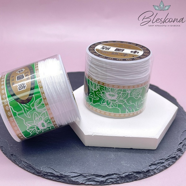 Белая  нить катушка 