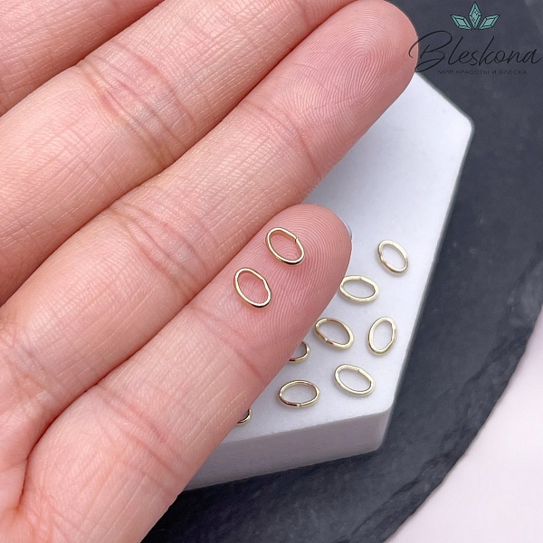 5,5*3,7*1,3 мм Цвет золото, Колечки овал уп. 1 гр. 
