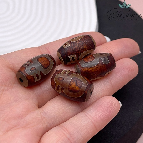 Бусина Дзи Кубера серо-коричневый бочонок 22*15 мм