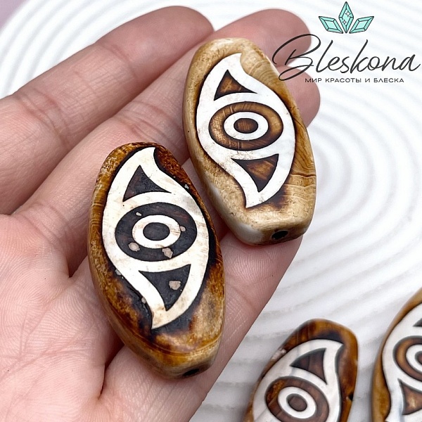 Бусина Дзи 2 глаза Феникса коричневая матовая 39*20 мм