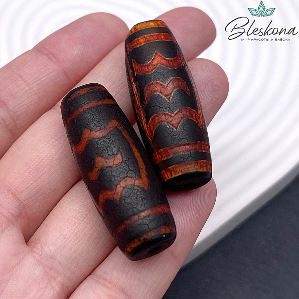 Бусина Дзи Птица Гаруда красно-черный бочонок 40*14 мм